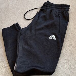 NWOT Adidas men’s black joggers. Large